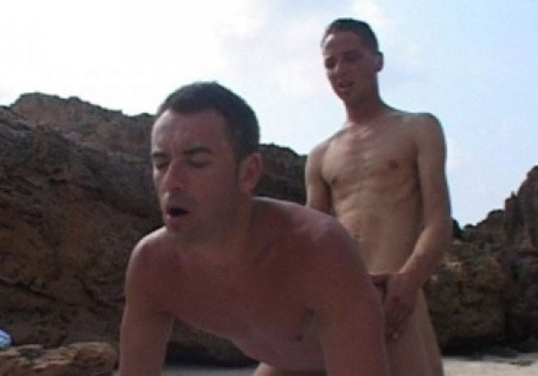 Horny gay fucked right on the beach by two arab men