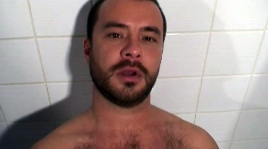 Hairy Bear Cub enjoying hot shower after work
