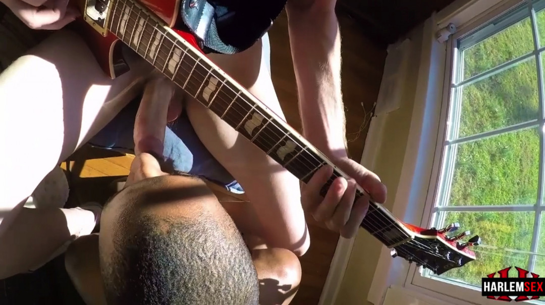 Gay blowjob while playing guitar
