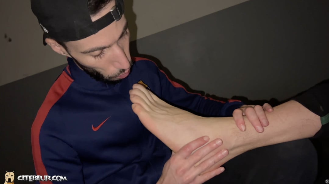 Cocksucker, a young submissive Arab twink, goes wild for his buddy Rabzouz’s manly feet