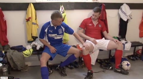 in a locker room two hunk footjob