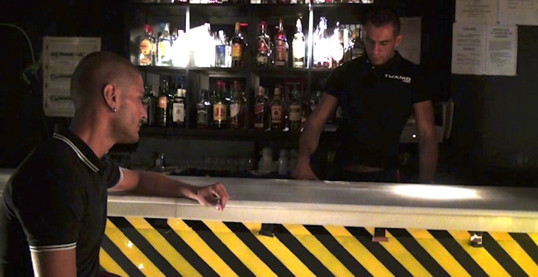 In a gay bar, a young boy gets drugged and sexually abused